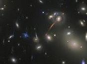 Abell 2218: cúmulo galáctico lente