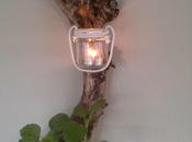 Candelabro-macetero reciclando materiales