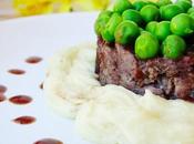 Timbal collares cordero vino tinto guisantes