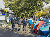 migrantes desalojados Calais París