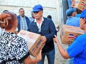 Familias escasos recursos reciben cajas navideñas Neiba