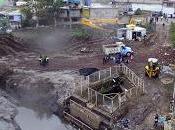 Mantienen trabajo coordinado para limpiar presa ángulo”